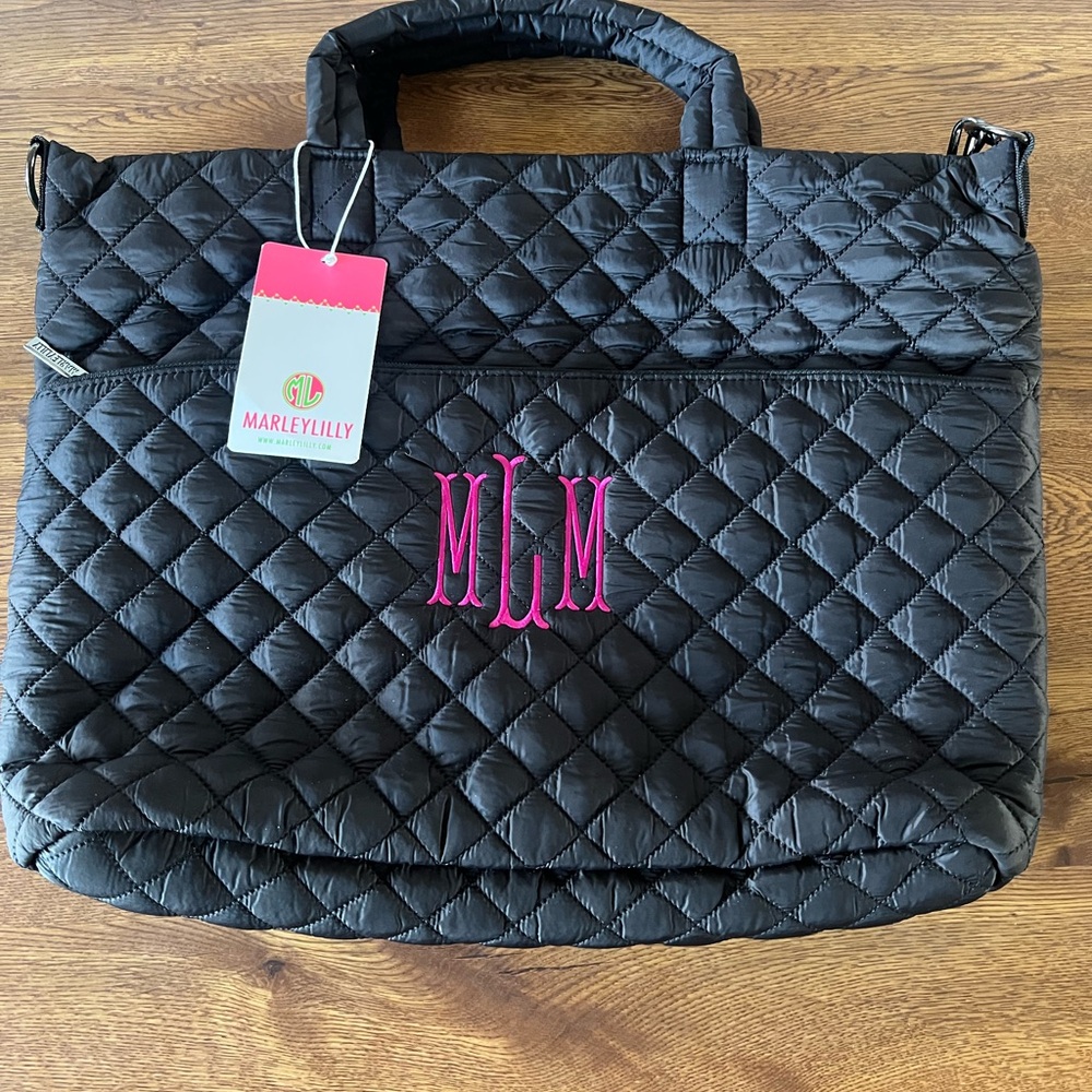 Marleylilly monogrammed black quilted laptop bag with the initials MLM